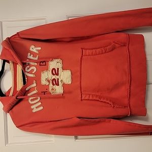 Hollister coral colored hoodie, size S